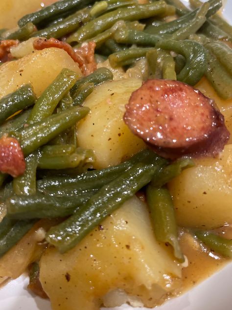 Smothered Green Beans with Bacon and Andouille Sausage Easy Smothered Green Beans, Smoked Sausage Green Beans Potatoes, Green Bean Potatoes And Sausage Crockpot, Portuguese Green Beans And Linguica, Smothered Green Beans With Sausage, How To Cook Andouille Sausage, Potato Green Beans And Sausage, Green Bean Potato Recipes, Potatoes Green Beans Sausage