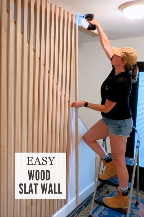 Build your own wood slat wall for your home! Turn any wall from basic to gorgeous. Full video tutorial here! Slotted Wood Accent Wall, Cheap Wood Slat Wall, Diy Wood Slat Wall Entryway, Diy Slat Wall Renter Friendly, Wood Wall Pattern, Diy Wood Slat Wall Stairs, Affordable Slat Wall, Diy Wood Slat Wall, Stairway Accent Wall