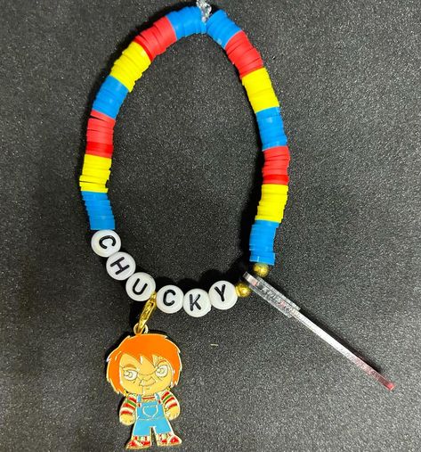 Chucky (Horror Film) Heishi Bracelet #handmadebracelet #heishibracelets #beadedbracelets #bracelets #personalizedbracelets #personalizedbracelet #prnnywise #pennywisecosplay #pennywisetheclown #pennywise🎈 #pennywise🤡 #horrorfilm #charmbracelets #charmbracelet #danglebracelet #danglebracelets #chuckydoll #chucky #chuckyfans #chuckybracelets #chuckybracelet Ghost Face Bracelet, Beaded Scream Bracelet, Chucky Jewellery, Horror Movie Beaded Bracelet, Horror Bracelet, Chucky Doll, Pennywise The Clown, Heishi Bracelet, Dangle Bracelet