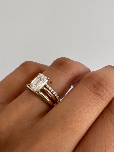 One of our most timeless engagement rings, The Elizabeth features a traditional basket setting. Its simplicity and versatility allows you to style with any wedding band.

Available in three different carat weights, this ring is a modern heirloom made to be treasured—then, now, always.
⠀⠀⠀⠀⠀⠀⠀⠀⠀
Band width: 1.9mm
Total carat weight: 1.4, 1.8, or 2.2ctw
Diamond cut: Emerald
Diamond clarity: VS1
Diamond color: F
Cut, Polish, Symmetry: Excellent Timeless Engagement Rings, Dream Wedding Ring, Timeless Engagement Ring, Fall Rings, Vs1 Diamond, Marquise Shape Diamond, Ring Guide, Cute Engagement Rings, Future Engagement Rings