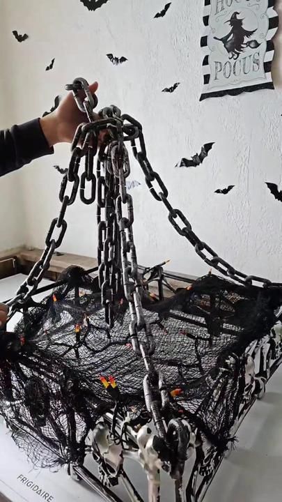 Spooky Chandelier Diy, Diy Halloween Chandelier Ideas, Halloween Skull Decorations Outdoor, Dollar Tree Halloween Chandelier Diy, Haunted Chandelier Diy, Underworld Halloween Decorations, Which Theme Halloween Decor, Dollar Tree Skull Fence Ideas, Halloween Skull Chandelier Diy