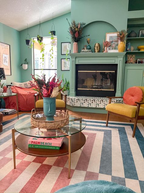 Colourful Front Room, Colorful Living Room With Fireplace, Green Couch Colorful Living Room, New Construction Decorating Ideas, Home Color Schemes Interior Bright, Colorful Cottagecore Living Room, Homes With Color, Quirky Home Decor Ideas, Studio Apartment Color Scheme