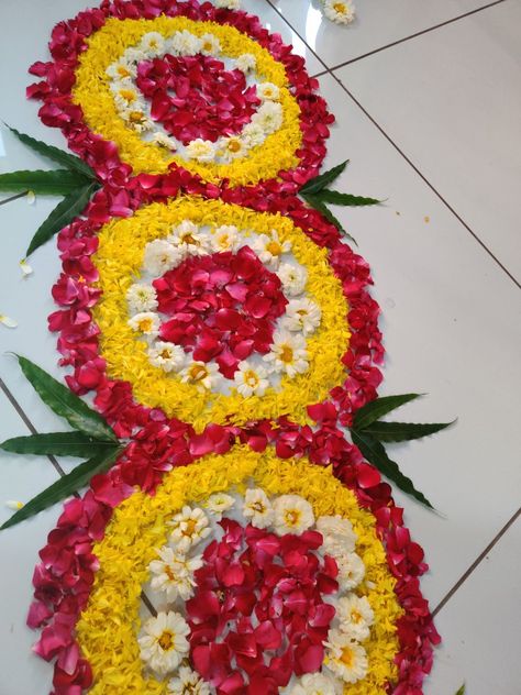 Flower rangoli, Flower Rangoli Design, kanku pagala path, welcome flower path, diwali Rangoli Design  #flowerpath #flowerrangoli #welcomeflowerpath #flowerrangolidesign #diwaliflowerrangoli #rangolidesign #flowerdecoration #welcomebride Welcome Home Flower Decoration, Flower Welcome Decoration, Welcome Flower Rangoli, Kankupagla Decoration At Home, Welcome Baby Decoration Ideas At Home With Flowers, Welcome Rangoli With Flowers, Welcome Flower Decoration, Kanku Pagala Decoration, Kanku Pagla Decoration At Home