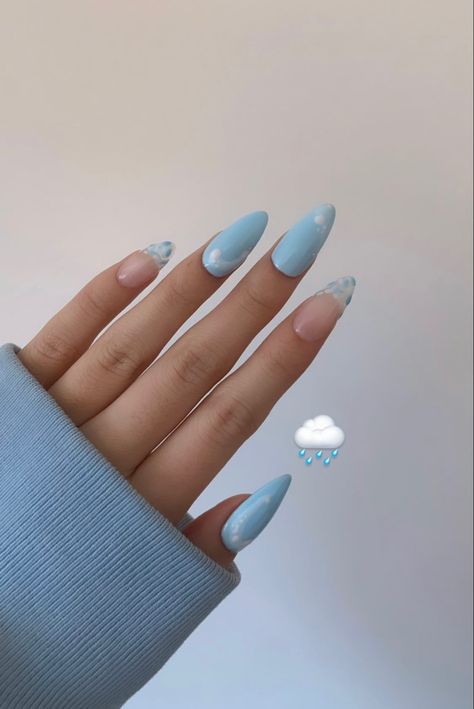 Hand in front of wall showing of baby blue “rainy day puddles” inspired nails. Pinky and pointer fingers have raindrops creating a french tip design while the other fingers have a puddle design. Blue Rain Nails, Rainy Day Nail Art, Rain Inspired Nails, Rainy Season Nails, Rain Nails Design, Rainy Day Nails, Rainy Nails, Rain Nails, Emoji Nails