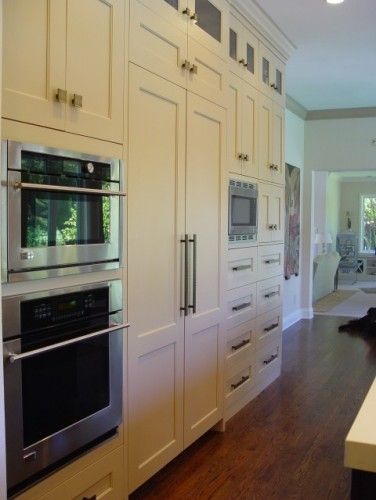 cabinet-front fridge, stacked double oven Hidden Fridge, Gourmet Kitchen Design, Fridge Design, Wall Ovens, Pantry Wall, Eclectic Kitchen, House System, Ideas Pictures, Traditional Kitchen