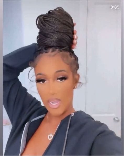 Knotless Box Braids With Curly Ends Bun, Buns With Knotless Braids, Knotless Braids In A Low Bun, Knotless Braids With Extra Edges, Knotless Bun With Curls, Knotless Braids Dramatic Edges, Boho Knotless Braids Bun, Knotless Braids In Bun, Medium Knotless Braids In A Bun