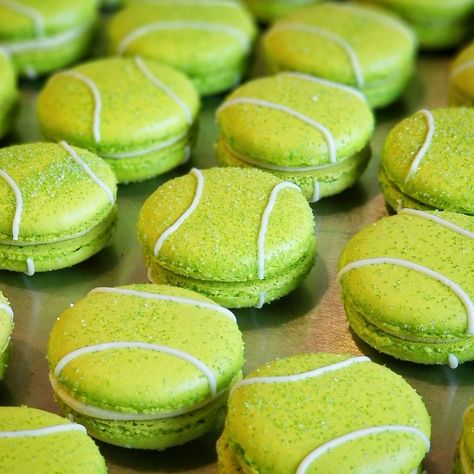 Tennis ball macarons with sanding sugar and white chocolate, birthday cake flavored filling Tennis Themed Birthday Cake, Tennis Ball Macarons, Wimbledon Party Decorations, Tennis Macarons, Tennis First Birthday, Tennis Cupcakes Ideas, Tennis Party Food, Tennis Bridal Shower Theme, Tennis Birthday Cake