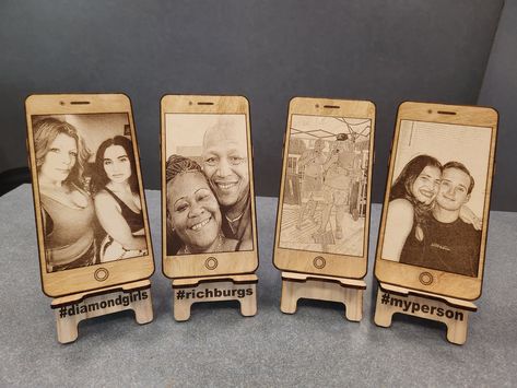 It's time to bring that favorite selfie to life. Whether for the desk or hanging on the wall we can make ya a gift that never fades. Laser engraved cell phone frame with your photo in the screen. Included is the personalized hastag easel for easy display on any desk or shelf.  Laser cut from 1/8th inch birch for light weight and durability. Upload photo via convo here at Etsy or directly at lazeritnow@gmail.com Measures 7x3.7inches Wall hangings are available upon request.  Just convo for sizes and prices. Laser Photo Engraving, Laser Engraved Photo On Wood, Wecreat Vision Laser Projects, Wood Laser Cut Ideas, Laser Cut Gift Ideas, Coaster Display, Phone Frame, Diy Laser Engraver, Workbench Plans Diy