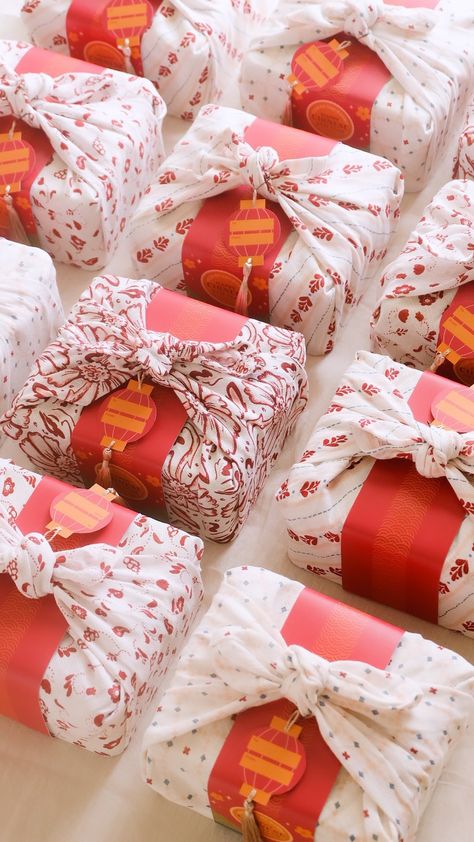 Chinese new year furoshiki gift wrapping using ikea kitchen towel fabric Hampers Packaging, Cny 2023, Xmas Hampers, Pretty Gift Wrapping Ideas, Eid Hampers, Japanese Gift Wrapping, The Year Of The Rabbit, Golden Rabbit, Chinese New Year Gifts