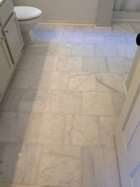 Our Style Challenge blogger Bryn used square cararra marble floor tiles to update the floors in her master bath #tile Washington Airbnb, Cheap Flooring Options, Marble Tile Bathroom Floor, Room Floor Tiles, Nest Decor, Marble Floor Tiles, Floor Inspiration, Gray Grout, Heated Floor