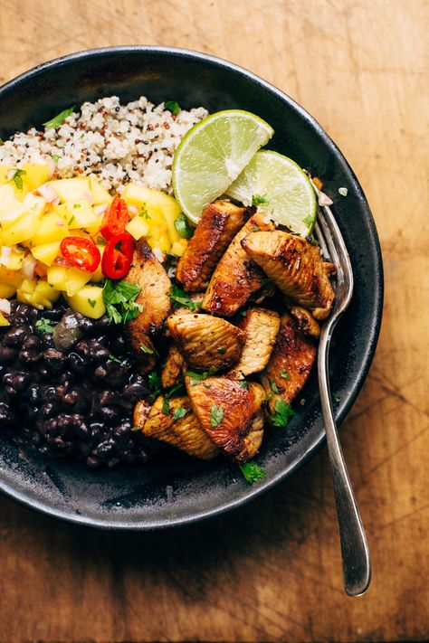 Cuban Mojo Chicken Quinoa Bowls with Mango Salsa and Black Beans - These bowls are bright and flavorful! The perfect quick meal to prep and enjoy all week long! The flavors just get better with time! #cubanchicken #mojochicken #chickenquinoabowls #quinoa | Littlespicejar.com Cuban Mojo Chicken, Man Meals, Mojo Chicken, Cuban Chicken, Cuban Mojo, Latino Food, Quinoa Bowls, Mango Salsa Recipes, Black Bean Quinoa