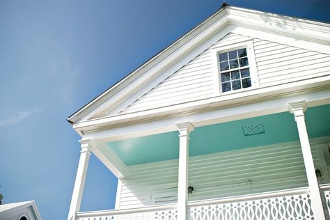 If You See a Blue Porch Ceiling, This Is What It Means Southern Paint Colors, Blue Porch Ceiling, Blue Porch, Haint Blue, Ceiling Painting, Porch Ceiling, Southern Decor, Blue Ceilings, Blue Lives