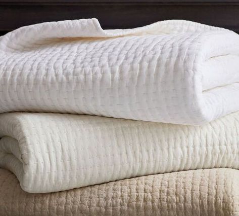 Pick-Stitch Handcrafted Cotton/Linen Quilt from Pottery Barn Here at TLD, we believe that the best beds are the ones with layers. In this post, we discuss how to make a bed like a designer using coverlets. | how to make a bed like a designer | home decor tips and tricks | home decor tips interiors | home decor budget ideas | home decor inspo living room | home decor ideas | how to make a bedroom cozy | how to make a bed like a hotel | Ivory Quilt, White Quilt Bedding, Tiffany Leigh Design, Pottery Barn Quilts, Bedroom Linen, White Coverlet, Pick Stitch, Organic Cotton Sheets, Cotton Clouds