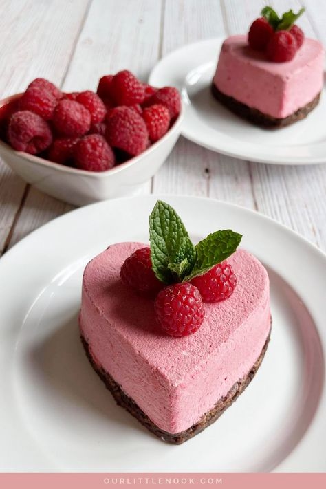 This raspberry mousse is delicate, scrumptious, and airy. The base for the mousse is a gorgeous brownie full of mini chocolate chips. Pair them together and it's a match made in heaven! This elegant dessert is perfect for Valentine's or for any special occasion. #valentinesdessert #desserts #raspberrymousse #raspberrydessert #sweets Romantic Desserts, Raspberry Desserts, Valentines Baking, Raspberry Mousse, Mousse Dessert, Valentine Desserts, Elegant Desserts, Baked Strawberries, Valentines Day Dinner