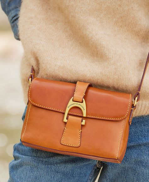 All You Need To Know About Florentine Leather Care Dooney And Bourke Crossbody Bag, Dooney Bourke Crossbody Bag, Small Leather Crossbody Purse, Dooney Bourke Handbags Outfits, Dooney And Bourke Handbags, Feed Bag, Duck Bag, Monogram Pendant, Tan Cowhide