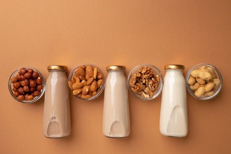 Healthy Food Branding, Amazing Food Platters, Food Business Ideas, Milk Brands, Non Dairy Milk, Juice Branding, Non-dairy Milk, Almond Nut, Food Branding