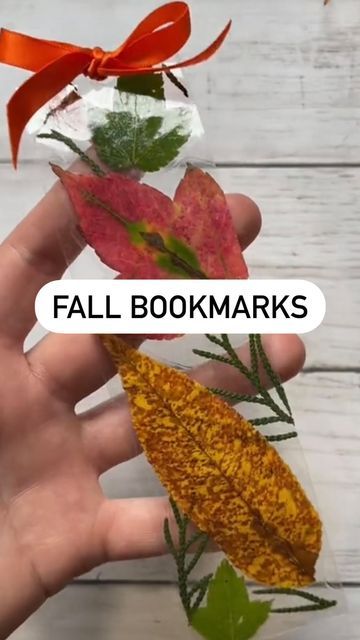 Kidscraftbarn on Instagram: "DIY bookmark for fall 🍁 These are addicting to make! All you need is ⬇️ *packaging tape *leaves/flowers *hole punch *ribbon I made my son a bracelet in another video similar to this a couple weeks back & the color of the leaves are still the same 🥰 Save for later or share with a friend! 💚 #fall #seasons #nature #crafts #easy #diy #bookmarks" Easy Autumn Crafts, Leaves Bookmark, Fall Bookmarks, Crafts Easy Diy, Autumn Leaves Craft, Leaf Bookmark, Diy Bookmark, Leaf Book, Autumn Bracelet