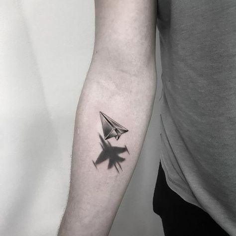 Pin em tattoo Jet Tattoo, Paper Airplane Tattoos, Paper Plane Tattoo, Wrist Band Tattoo, Tattoo Leggings, Plane Tattoo, Shadow Tattoo, Small Girly Tattoos, Airplane Tattoos