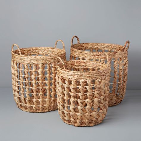 Handmade in Vietnam Ethically crafted in small batches Dimensions: 18.25"D x 18" H16"D x 17" H14.5"D x 15.5"H Tidying up doesn't have to be boring. Our Water Hyacinth Baskets are expertly woven by master artisans in Vietnam making each item truly one-of-a-kind. Store your goods safely with sustainable statement pieces that keep your home feeling fresh and tidy all year long. Care: Hand wash with mild soap. Black Taper Candles, Kitchen Utensil Organization, Cheese Serving Board, Home Feeling, Bar Storage, Organization Decor, Water Hyacinth, Taper Candle Holders, Basket Sets