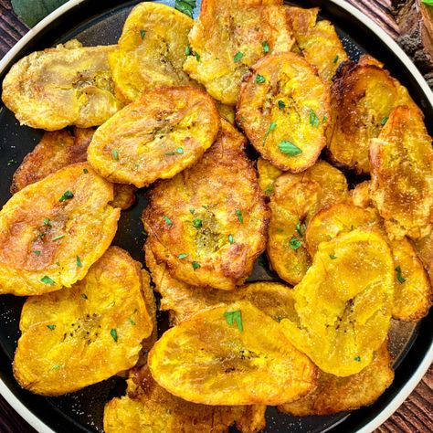 Fried Plantains are an authentic Caribbean dish. Scrumptious, a little sweet and fried to perfection! Simply and easy, this is the best appetizer or side dish for any meal. Plantains are a staple in pretty much every Haitian meal. When I was a young child my mother always made fried plantains. Depending on the type... Read More The post Fried Plantains appeared first on letseatcuisine. Haitian Recipes Authentic, Plantains Recipe, Baked Plantains, Brown Stew Chicken, Cod Fish Recipes, Fried Plantains, Mexican Menu, Plantain Recipes, Easy To Make Snacks