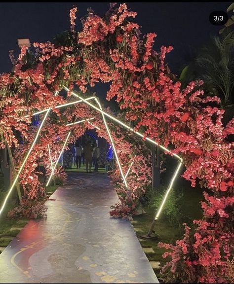 Night Party Decorations Outdoor, Sangeet Entrance Decor Outdoor, Extravagant Bridal Shower Ideas, Neon Wedding Decor, Outdoor Night Wedding Decorations, Outdoor Sangeet Decor Night, Wedding Outdoor Decoration Night, Birthday Party Entrance Decoration, Outdoor Stage Decoration