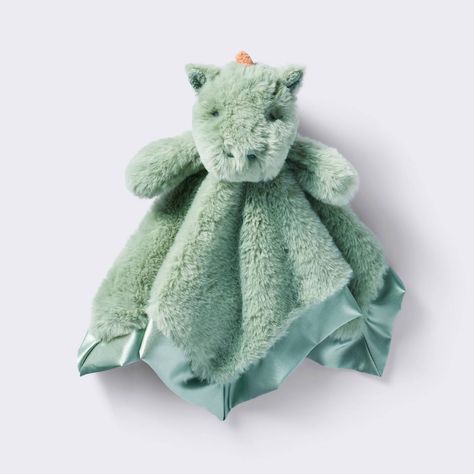 Add some whimsical wonder to your little one's nursery with this Small Security Blanket Crib Toy from cloud island™. Crafted from soft, fuzzy fabric, this green security blanket is fashioned in a handkerchief style with matching satin trim. It showcases an adorable dragon soft toy at the top with outstretched arms and wings to capture your little one's attention right away. Perfectly sized for stroller rides and car trips, this blanket makes a cozy companion for your child during playtime and be Dragon Nursery Boy, Fairy Tale Nursery Theme, Dragon Baby Nursery, Dragon Themed Nursery, Dragon Nursery Theme, Baby Boy Dinosaur Nursery, Medieval Nursery, Wolf Amigurumi, Sage Nursery