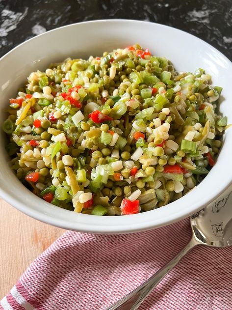 This classic chilled vegetable salad recipe is made with white shoepeg corn, French-style green beans, Le Sueur English peas, and marinated in a sweet and tangy oil and vinegar dressing. It's the perfect side dish for potlucks, picnics, barbecues, and any summer meal! Marinated Pea Salad, Marinated Corn Salad, Shoepeg Corn Salad Recipe, English Pea Salad, Shoepeg Corn, Oil And Vinegar Dressing, Green Pea Salad, Marinated Salad, Corn Vegetable