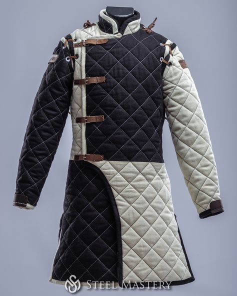 Whether you prefer the bold statement of a solid color or wish to personalize your armor with intricate designs, our team is dedicated to crafting gambesons that reflect your individual style and historical preferences. Gambeson Armour, Medieval Gambeson, Cloth Reference, Armor Reference, Reference Male, Armor Ideas, Jason Mask, Medieval Paintings, Oc Stuff