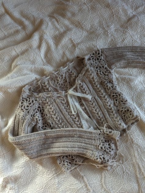 Lacy crochet cardigan with a lace to tie in the front Dainty Crochet Cardigan, Crochet Button Up Cardigan, Crochet Wrap Cardigan, Crochet Button Up, Crochet Lacy Cardigan, Crochet Tie Cardigan, Crochet White Cardigan, Dark Academia Crochet, Lace Crochet Cardigan Pattern