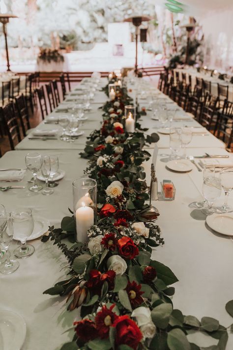 Winter Wedding With Red Accents, Deep Red And White Wedding, Winter Wedding Centerpieces Rectangle Table, Candle Decorations For Wedding, Black White Red Green Wedding, Christmas Arch Wedding, Red And Green Table Decor, Red White Green Floral Centerpieces, Winter Wedding Red And White