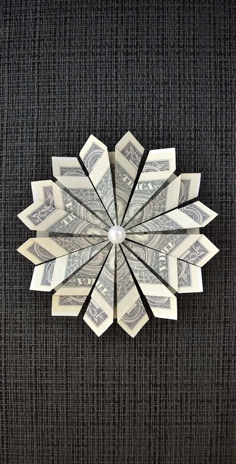 The money flower is a cute dollar craft. We need 4 dollar bills, a thread, scissors, a bead. The idea and design by Anastasia Prokuda. I wish you a pleasant viewing! Subscribe to my channel! How To Make A Flower Out Of A Dollar Bill, Money Stars Dollar Bills, Folding Dollars Into Flowers, Dollar Bill Origami Butterfly Easy, 2 Dollar Bill Origami, Dollar Bill Gift, Folding Money, Money Flowers, Dollar Origami