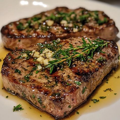 🥩🧈 Juicy and flavorful! Try our Herb-Butter Steak for a delicious meal! 🥩✨ #SteakLovers #FlavorfulMeals Herb-Butter Steak Ingredients: Ribeye steak (2, about 1 inch thick) Butter (4 tbsp, softened) Fresh rosemary (1 tbsp, chopped) Fresh thyme (1 tbsp, chopped) Garlic (2 cloves, minced) Olive oil (2 tbsp) Salt (to taste) Black pepper (to taste) Instructions: Preheat a skillet over medium-high heat and add olive oil. Season steaks with salt and pepper. Cook steaks for 3-4 minutes per side f... Steak Garlic Butter, Food Lover Aesthetic, Steak Aesthetic, Seasoned Steak, Beef Steak Recipes, Butter Steak, Dream Food, Chinese Cooking Recipes, Food Crush