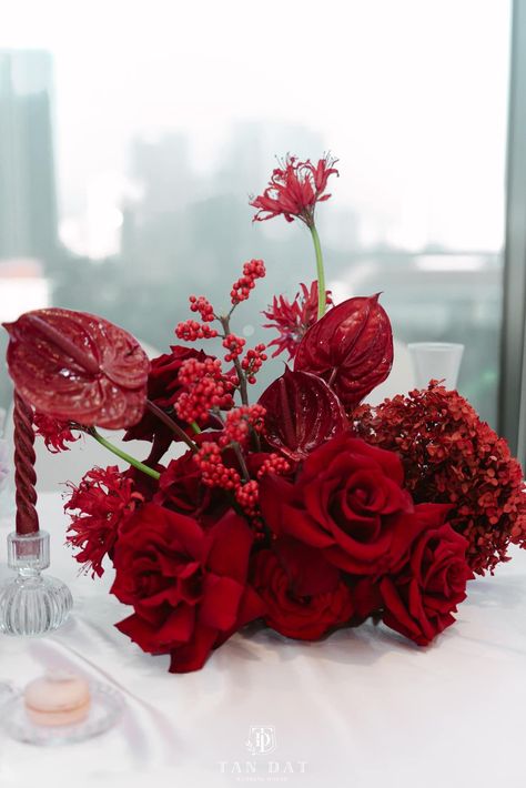 All Red Floral Arrangements, Modern Red Centerpieces, Red Floral Table Arrangements, Red Orchids Flower, Anthurium Table Arrangement, Red Engagement Party Decorations, Red Anthurium Centerpiece, Red And Black Dinner Table Decor, Red Flower Centerpieces For Party