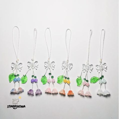 °❀⋆ཐི fairy blossom bow drop ཋྀ.ೃ࿔*:･ info: - phone charm / camera keychain - color: mix (pastel colors) how to order: go to our store link or send us a message to order!! ⋆𐙚₊ tags ˚⊹♡ #phonecharm #bead #cameracharm #smallbusiness #handmade #keychain #dainty #butterfly #beadsjewelry #charms #explore #pinterestaesthetic #fairy #bow Camera Keychain, Dainty Butterfly, Handmade Keychain, Color Mix, Phone Charm, Pastel Colors, Blossom, Charms, Pastel