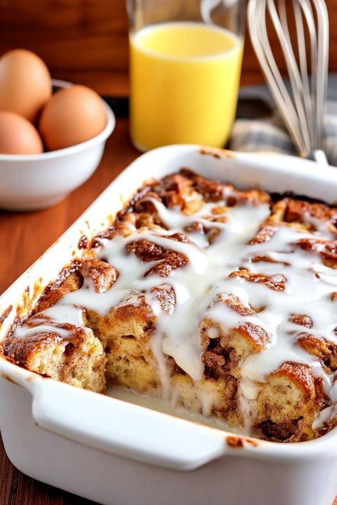 Indulge in the ultimate breakfast treat with this decadent cinnamon roll French toast casserole. Made with layers of fluffy cinnamon rolls soaked in a rich custard mixture and baked to perfection, this dish is perfect for lazy weekend mornings or special occasions. The warm flavors of cinnamon and vanilla will fill your kitchen as it bakes, making everyone eager to dig in. French Toast Cinnamon Roll Casserole, Tiramisu Cinnamon Rolls, Baked Cinnamon Roll Casserole, Cinnamon French Toast Casserole, Cinnamon Roll French Toast Casserole, Cinnamon Roll French Toast Bake, Cinnamon French Toast Bake, Fluffy French Toast, Bbq Pork Recipes