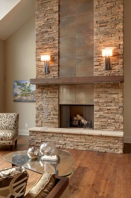 Contemporary living room stacked stone fireplace wooden mantel glass coffee table Modern Stone Fireplace, Stone Fireplace Designs, Design Camino, Tall Fireplace, Stacked Stone Fireplaces, Stone Walls Interior, Rustic Fireplace, Best Home Interior Design, Sconces Living Room