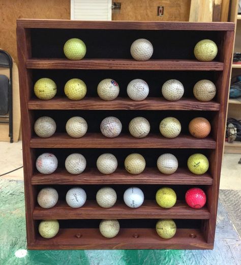 I have been busy making Christmas presents and I wanted to share what I made for my Dad. It didn’t come out as perfect as I was hoping, but I think he will still like it. Excuse the dirty golf balls, they were the only ones I could round up on short notice. As you can see … Golf Ball Display, Golf Ball Display Case, Diy Golf, Golf Birthday Gifts, Golf Ball Displays, Golf Ball Gift, Golf Ball Crafts, Ball Display, Ping Golf