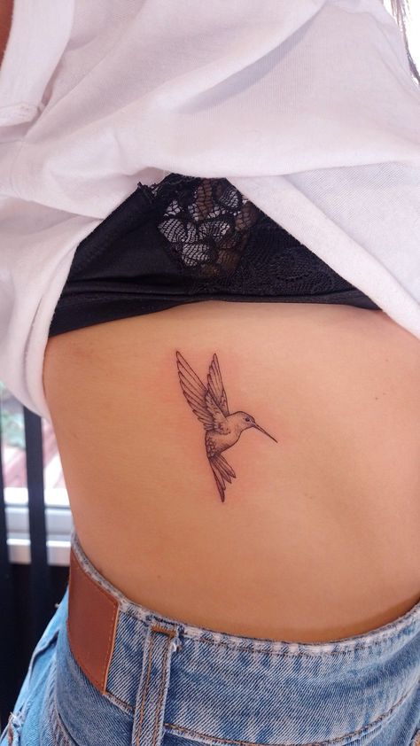 #tattoo, #tattoos, #inked, #tattooart, #tattooedwomen, #tattooedguys, #tattooinspiration, #tattooideas, #tattooworldwide, #tattoosociety, #InkLaughs, and #TattooFails​ Humming Bird Spine Tattoo, Hummingbird Bird Tattoo, Rib Hummingbird Tattoo, Hummingbird Tattoo Upper Arm, Hummingbird Matching Tattoo, Hummingbird Tattoo Ribs, Hummingbird Rib Tattoo, Delicate Hummingbird Tattoo, Humming Bird Tattoos For Women