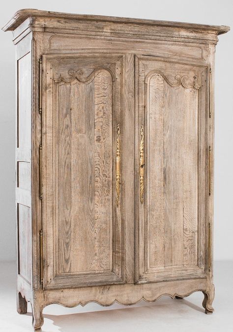 The Estelle French Oak Armoire - Circa 1800 redefines beauty with its historical charm and graceful presence. Precise hand-carved curvature details surround the oversized doors which reveal 3 fixed storage shelves. A bleached oak finish is neutral and easy to incorporate. #french, #antique, #armoire French Antique Furniture, Rustic French Furniture, Armoire Decor, French Country Armoire, Louis Xvi Furniture, Elegant Outdoor Furniture, Mirrored Armoire, Cottage French, French Armoire