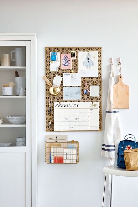 Radiator screens do a nice job covering heaters, but they've got so much more design potential. With their graphic patterns and polished finishes, the inexpensive overlays can make a basic bulletin board look expensive. Use extra-long thumbtacks to pin up a calendar, phone numbers, and invitations.  #marthastewart #homeimprovementideas #easyhomedecorideas #details #homedecorinspiration Kitchen Bulletin Board, Radiator Screen, Radiator Covers, Narrow Shelves, Unique Shower Curtain, Bedroom Décor, Dresser Decor, More Design, Organizing Ideas