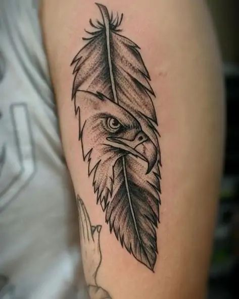 The Eagle Tattoo Meaning And 115+ Soaring Eagle Tattoos Feather Pen Tattoo, Feather Tattoo For Men, Phoenix Feather Tattoos, Eagle Feather Tattoos, Bald Eagle Tattoos, Feather Tattoo Colour, Infinity Tattoo With Feather, Inspiring Tattoos, Feather Tattoo Meaning