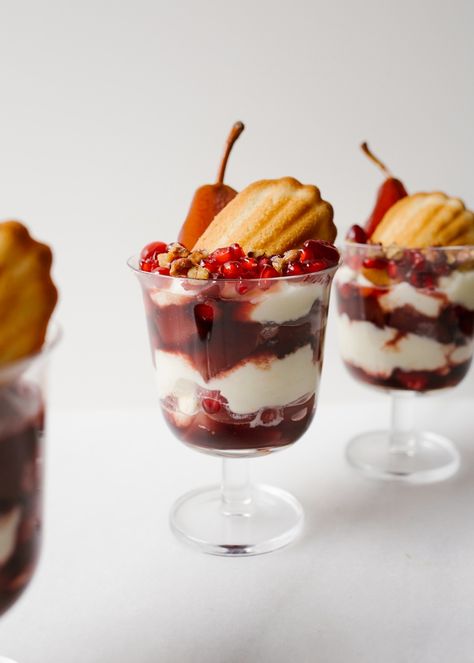 Poached Pear Trifles with wine pears, cranberries, pomegranate, Donsuemor madeleines and a creamy whipped filling. These trifles are sweet and tangy and boozy all at the same time. First up are red wine and cinnamon poached pears and cranberries that are cooked until soft. These are layered with a cream cheese or mascarpone whipped filling scented with orange zest, French madeleines, and more fresh fruit! Make these treats for a fancy holiday gathering. You can make large trifles or smaller ... Angel Food Cake Trifle, Strawberry Angel Food Cake, Mini Trifle, Strawberry Shortcake Trifle, Easy Strawberry Shortcake, Strawberry Trifle, Recipe Strawberry, Trifle Dish, Strawberry Shortcake Recipes