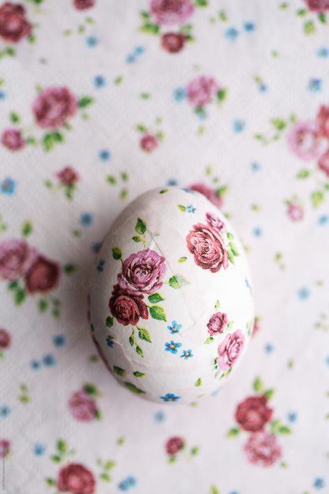 Decoupage Easter egg decorated with paper napkins by Ruth Black  - Stocksy United #stock #stockphoto #easter #eastereggs #crafts #wallpaper #pattern #floral