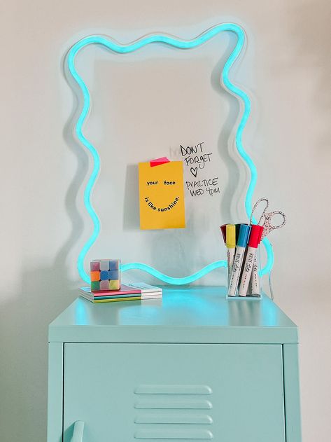 Our new neon dry erase frame keeps you organized where you can jot down your to do’s, doodles and messages. A fun addition to keep you organized in any space. Dimensions: 18"W x24"H Color: Ice Blue Ships in 7-10 days Made in USA Included with your sign: Mounted onto clear acrylic Remote with the ability to dim from 10% to 100% & flash Transparent cord 12 V UL listed power adapter Pre-drilled holes for wall mounting Clear Room Decor, Colorful Room Decor Ideas, Bright Apartment Decor, Neon Furniture, Fun Office Decor, Neon Frame, Colorful Room Decor, College Room Decor, Acrylic Decoration