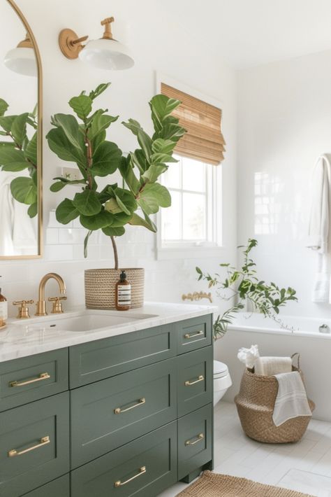 27 Luxurious Gold Bathroom Ideas You’ll Love Bathroom Decor Green Cabinets, Deep Green Bathroom Vanity, Green Cabinets Bathroom Ideas, Green Gold And Wood Bathroom, Sage Master Bath, Bathroom Remodel Green Vanity, Green On Green Bathroom, Grey Green Bathroom Vanity, Olive Green And Gold Bathroom