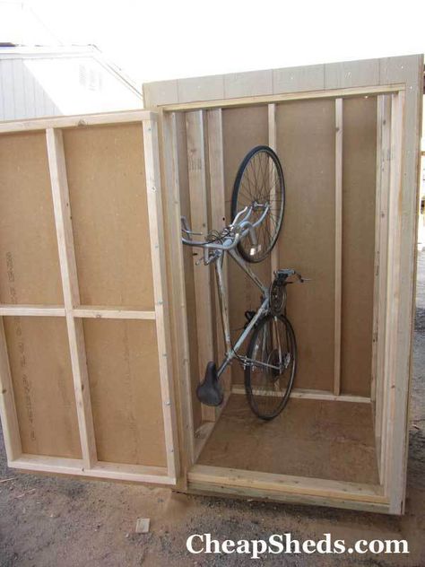 vertical bike shed Bicycle Storage Shed, Vertical Bike Storage, Outdoor Bike Storage, Vertical Bike, Clutter Solutions, Build A Bike, Outdoor Biking, Bicycle Storage, Bike Shed