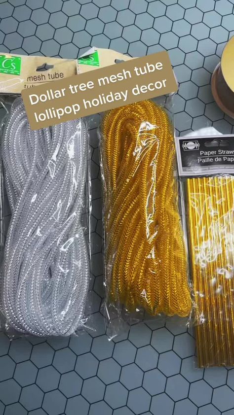 Dollar tree mesh tube lollipop holiday decor #foryou #dollartree #dollartreediy #diy #diyprojectsideas #diyproject #homedecor #christmas2021 Plastic Tubing Crafts, Tube Mesh Ideas, Diy Lollipops Decorations, Dollar Tree Mesh Tube Ideas, Dollar Tree Lollipop Diy, Mesh Tube Crafts Christmas, Mesh Tubing Crafts Diy, Plastic Coat Hanger Crafts, Dollar Tree Diy Christmas Decorations