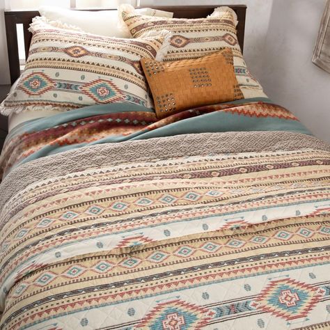 PRICES MAY VARY. INDIAN SUMMER PHOENIX RUFFLE 3 PIECE FULL/QUEEN QUILT SET DESIGN: Combining geometric motifs of the Southwest with warm neutral colors of the desert including tan, rust, turquoise, red gold and brown, the Indian Summer Quilt Set will fit in perfectly with your rustic, desert, Southwest, and Western home décor. This reversible quilt features a complimentary print on reverse for two looks in one. SOFT AND COMFORTABLE LUXURY: Made from materials that will never feel heavy, stiff or Rust Western Bedroom, Southwest Bedroom, Country Room, Western Room, Ruffle Quilt, Horse Pillow, King Quilt Sets, Desert Southwest, Turquoise Print