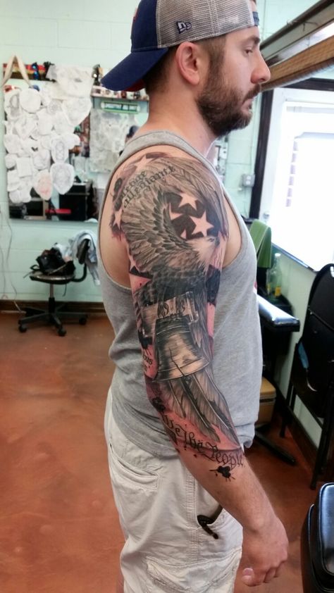 American themed tattoo Eagle Upper Arm Tattoo, American Themed Tattoo, Mens Half Sleeve Tattoo Upper Arm, Patriotic Tattoos Sleeve For Men, America Tattoos For Men, Western Sleeve Tattoo For Men, Patriotic Tattoos Sleeve, Patriotic Sleeve Tattoos For Guys, Usmc Tattoo Sleeve