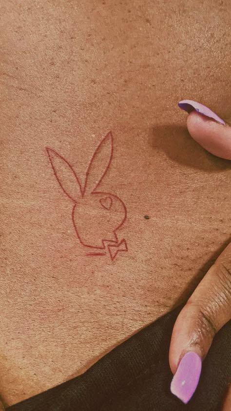 Playboy Bunny Tattoo Hip, Playboy Tattoo Design, Tiny Hip Tattoos For Women, Play Boy Tattoo, Peekaboo Tattoo, Tattoos For Baddies, Playboy Bunny Tattoo Design, Playboy Drawing, Under Bum Tattoo